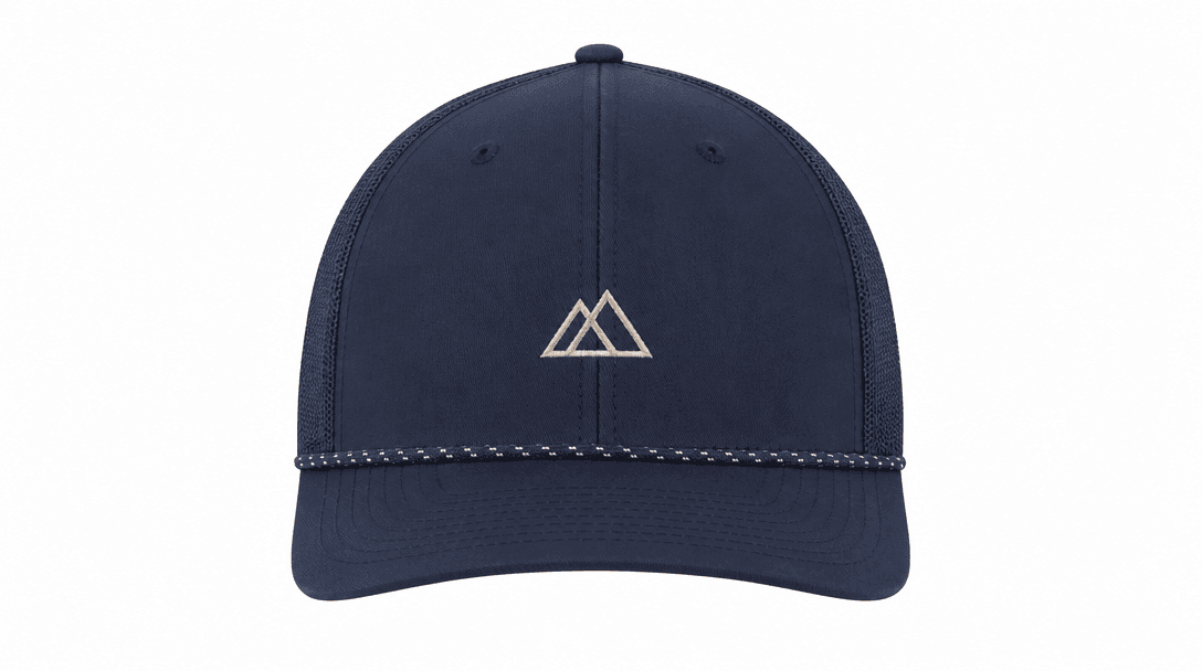 Minimalist ecommerce product photography setup: a single premium structured cap centered on a seamless white studio swee