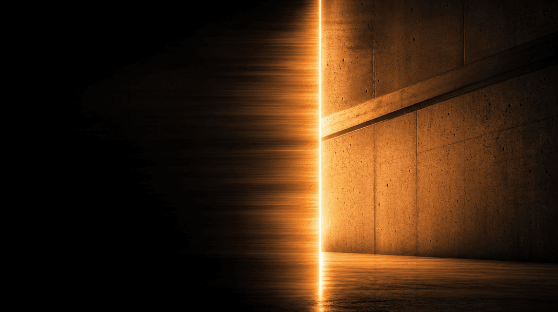 Abstract cinematic wipe transition visualization: a razor-sharp vertical blade of warm amber light cutting across a dark
