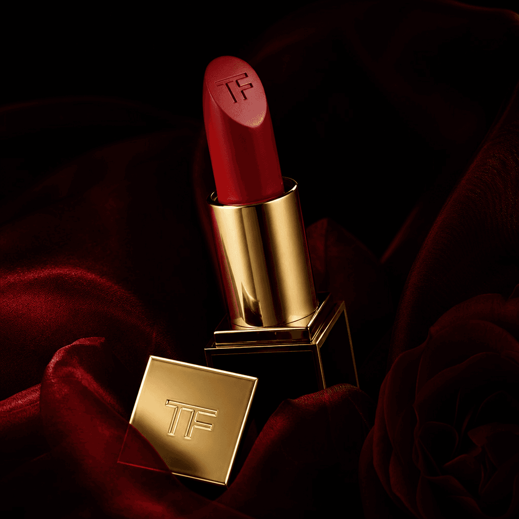 Luxury lipstick product positioned sensually, editorial photography, sophisticated styling, dark luxurious background, d
