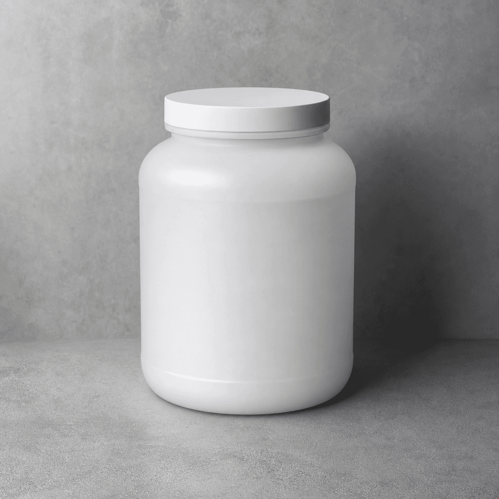 Minimalist studio product photography of a frosted white protein powder tub on a cool grey textured surface, soft overhe