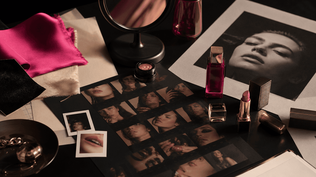 Curated beauty campaign still life with contact sheets, reflective cosmetic packaging, fabric swatches, a small mirror, 