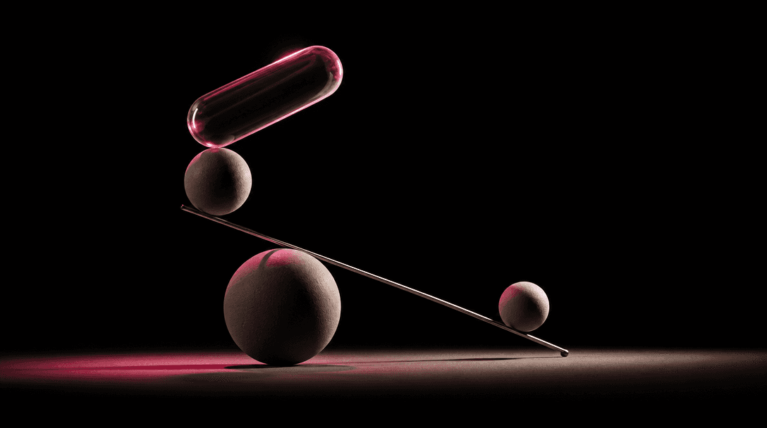 An abstract equilibrium sculpture made from matte ceramic spheres, a thin chrome rod, and a single translucent capsule f