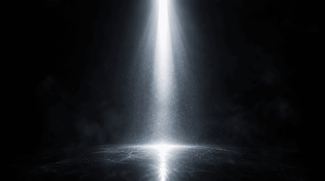 Abstract cinematic image of a beam of intense pure light striking a dark polished surface from above, illuminating fine 