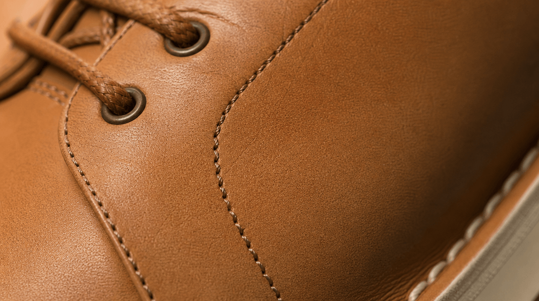 Shoe material and texture detail macro photography, leather or fabric close-up, professional studio lighting, quality ma
