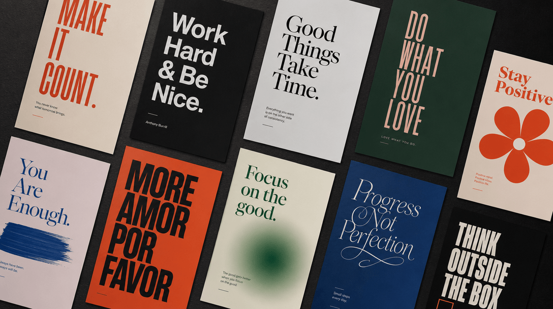 Flat lay of printed typography posters arranged artfully, each with different font and color, soft studio lighting from 