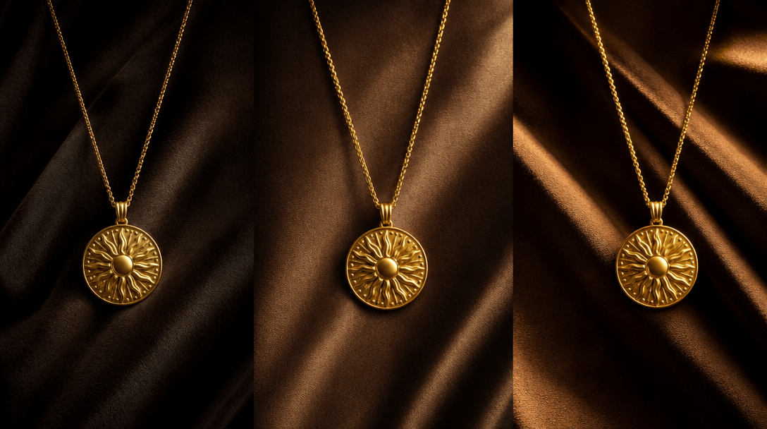 Abstract concept visual: three identical gold pendant necklaces arranged side by side on dark draped fabric, each under 