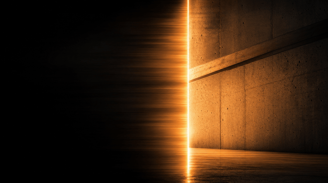 Abstract cinematic wipe transition visualization: a razor-sharp vertical blade of warm amber light cutting across a dark