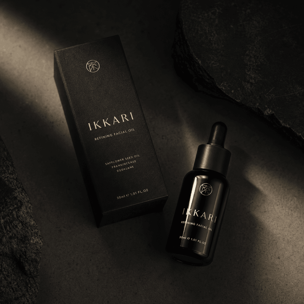Skincare product in premium packaging, shot from above with artistic shadows and lighting. Dark editorial mood, minimali