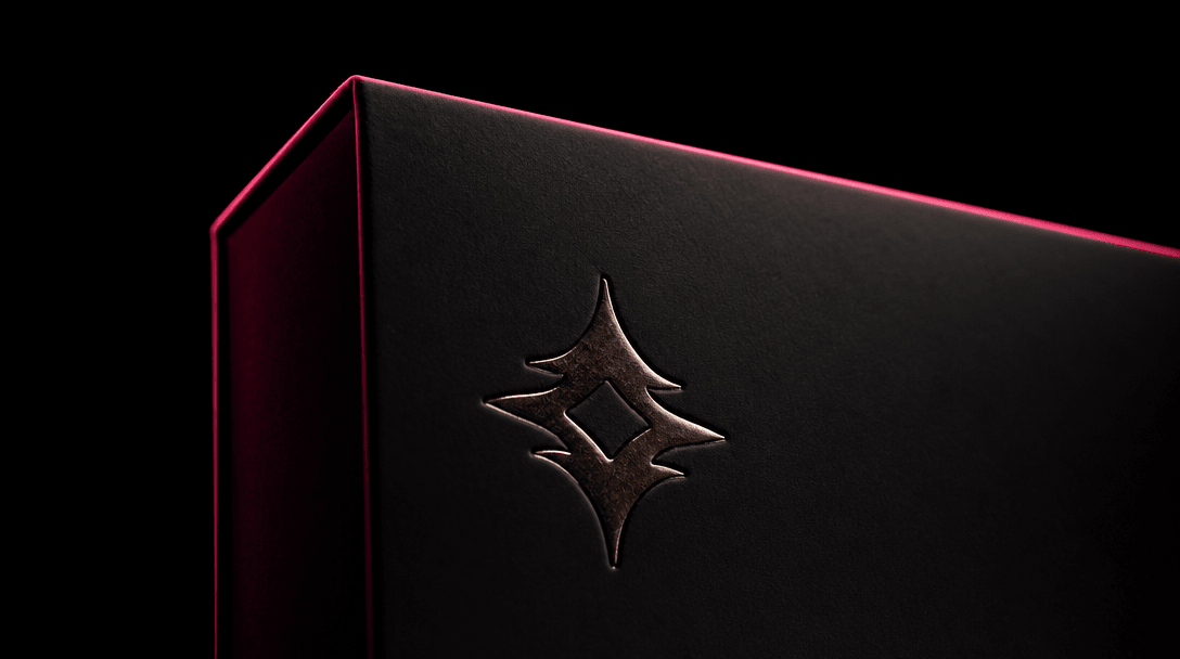 Cinematic close-up of a luxury product package — a matte dark box with clean sharp typography and a brand symbol — again