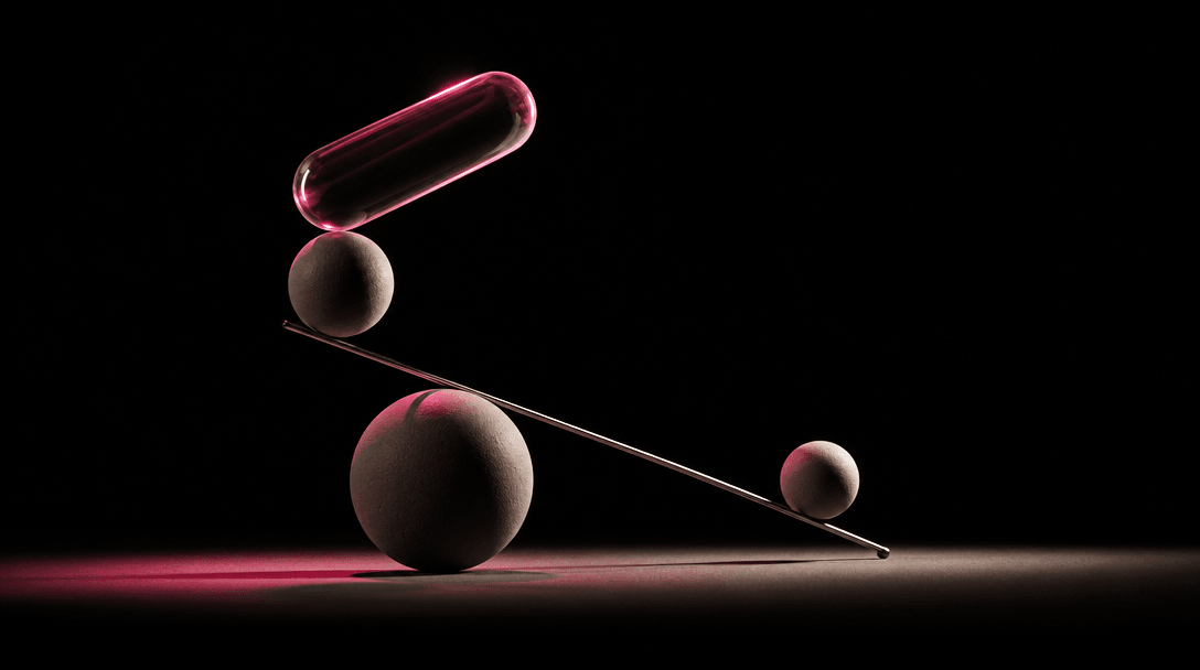An abstract equilibrium sculpture made from matte ceramic spheres, a thin chrome rod, and a single translucent capsule f