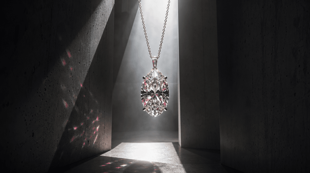 A diamond pendant suspended in a shaft of intense midday sunlight between dark concrete walls, precise hard-edged shadow