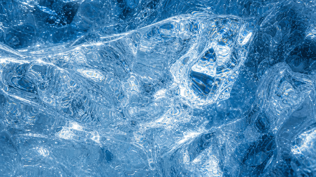 Close-up of crystal ice texture with light refracting through frozen formations. Macro photography aesthetic, blue-white