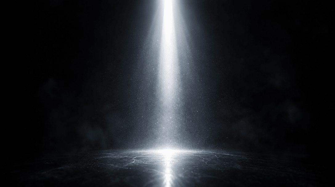 Abstract cinematic image of a beam of intense pure light striking a dark polished surface from above, illuminating fine 