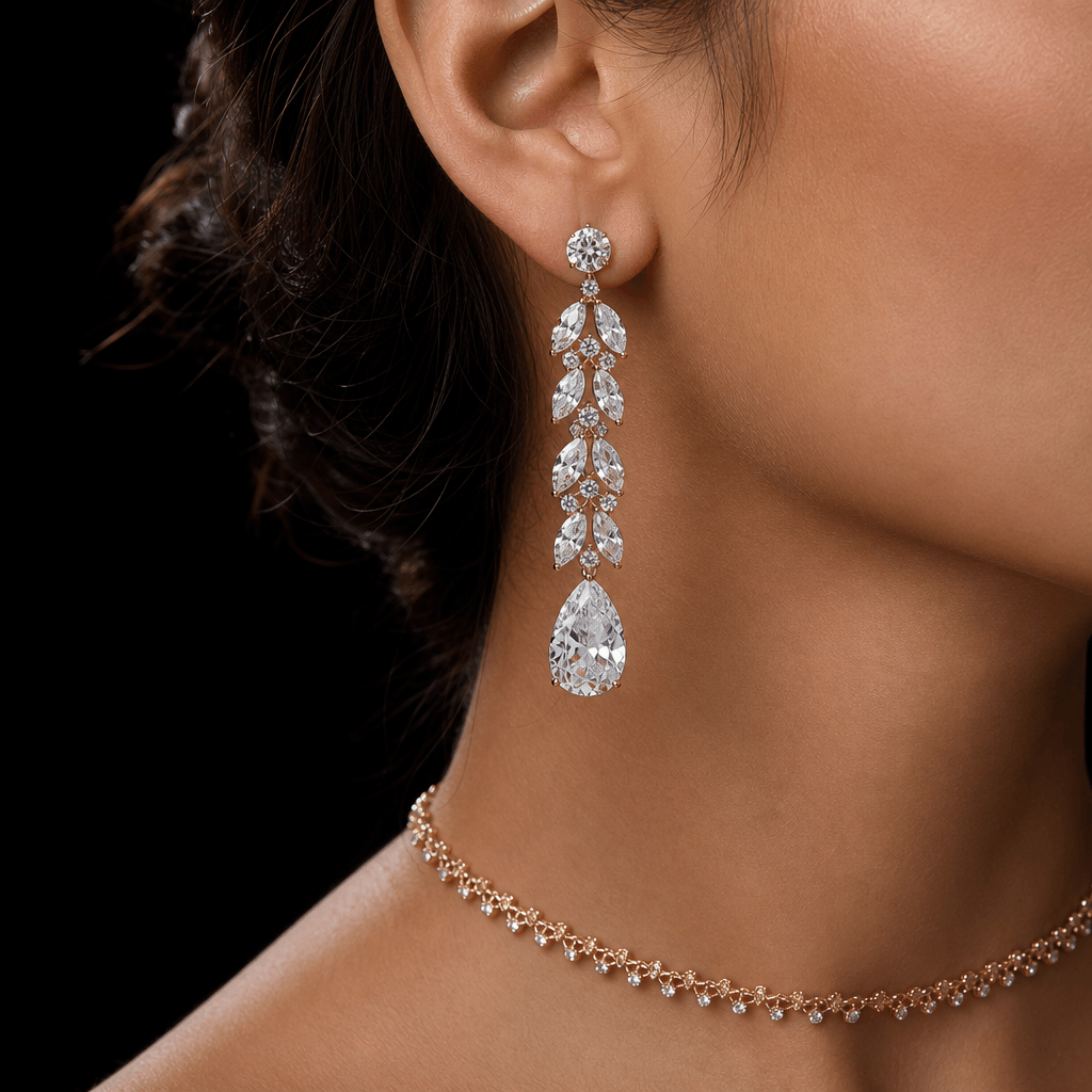 Close-up of a woman's ear and neck adorned with cascading diamond drop earrings and a delicate gold choker, pure black b