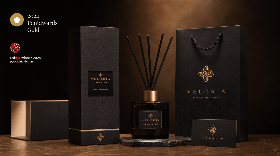 Professional studio setup with branded luxury packaging and award-winning design product photography, warm directional l