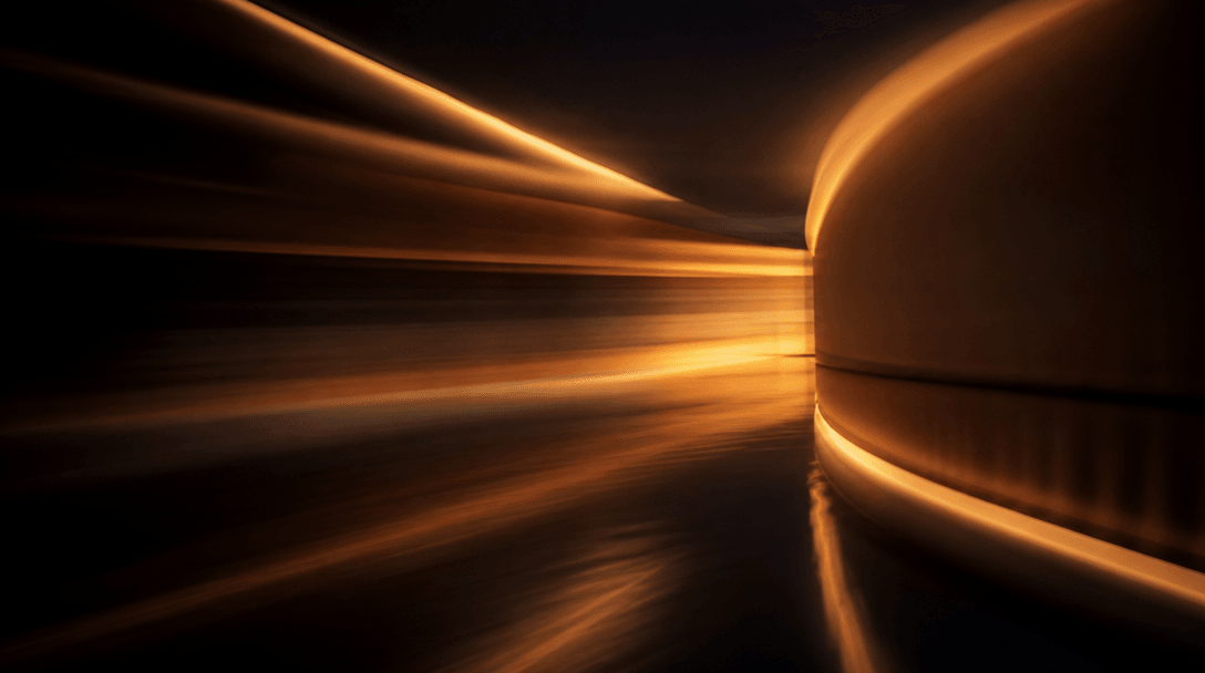 Abstract motion-blur impression of a smooth camera glide through a softly lit corridor, warm amber streak-lines of light