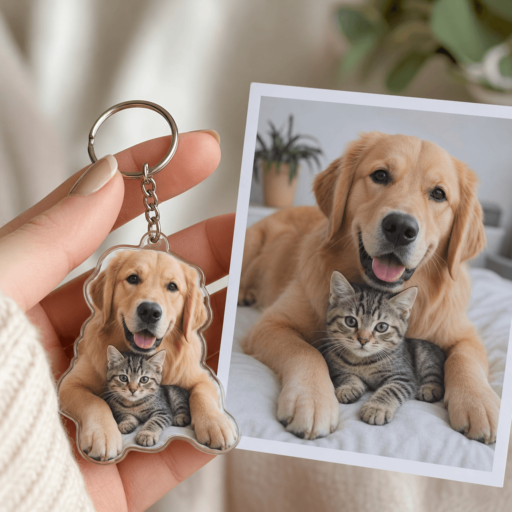 A hand holding a finished custom keychain next to the original source photo, showing the transformation. Soft natural li
