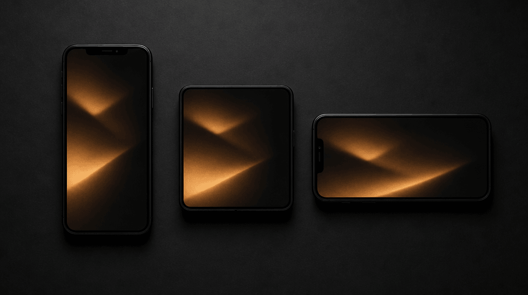 Dark editorial flat-lay of three matte-black smartphones arranged in portrait, square, and landscape orientations on a b