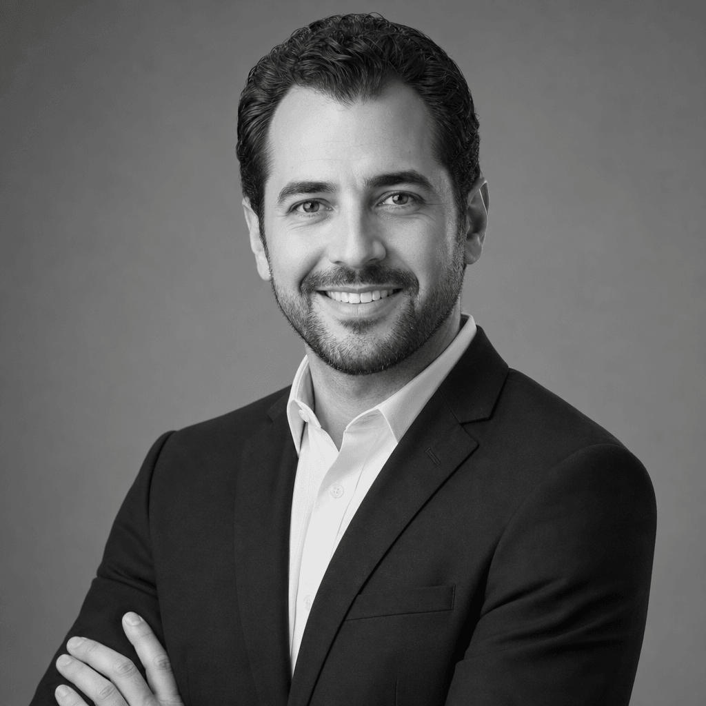 Professional corporate headshot, monochrome, studio lighting, clean background, business portrait photography, sharp foc