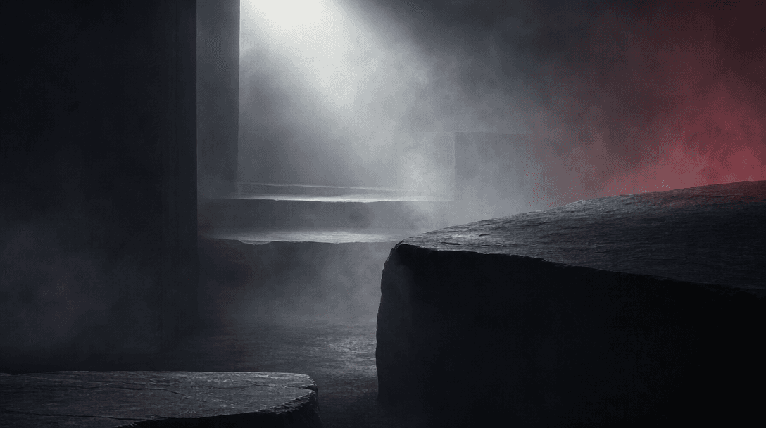 Layers of fine silver fog moving through a dark studio landscape of matte stone planes, a narrow beam of off-white light