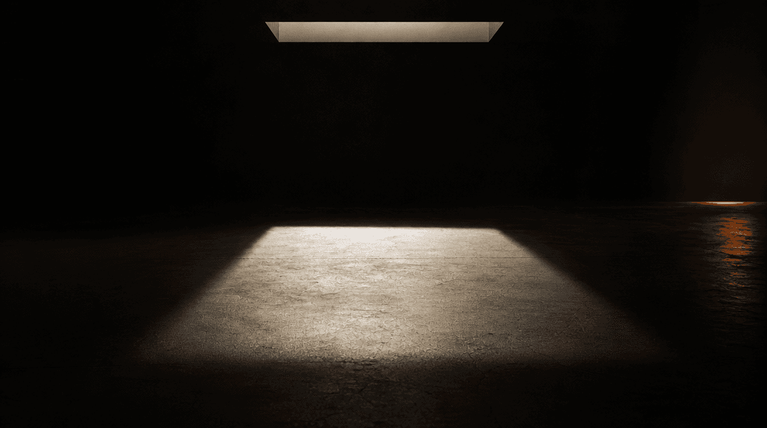 Abstract cinematic wide shot of a dark near-black surface with a single rectangular overhead light casting a clean brigh