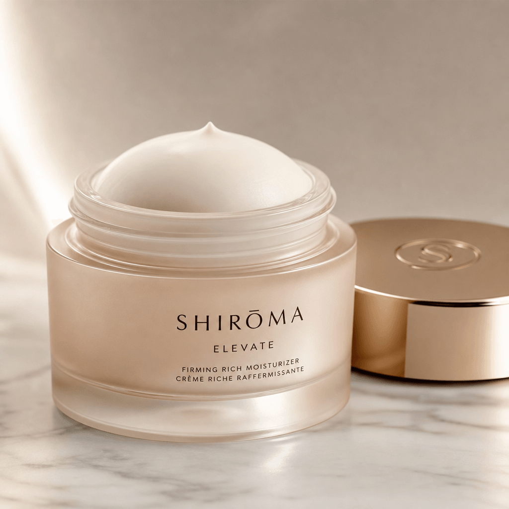 Beauty product cream jar opened with a perfectly formed dome of product, soft side lighting, neutral background, luxury