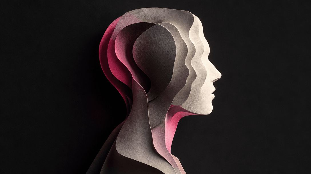 Abstract portrait concept visualized through layered translucent profile silhouettes cut from textured photographic pape