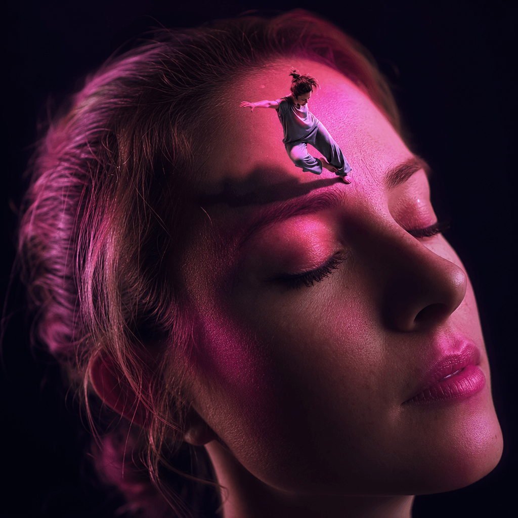 Miniature figure in dynamic gesture on forehead area, cinematic lighting with hot pink highlights and deep shadows, dark