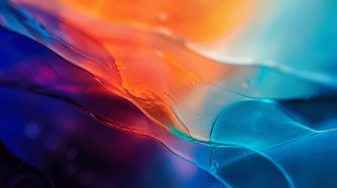 Abstract macro photograph of overlapping translucent color gradient layers — deep indigo, warm coral, electric teal — me