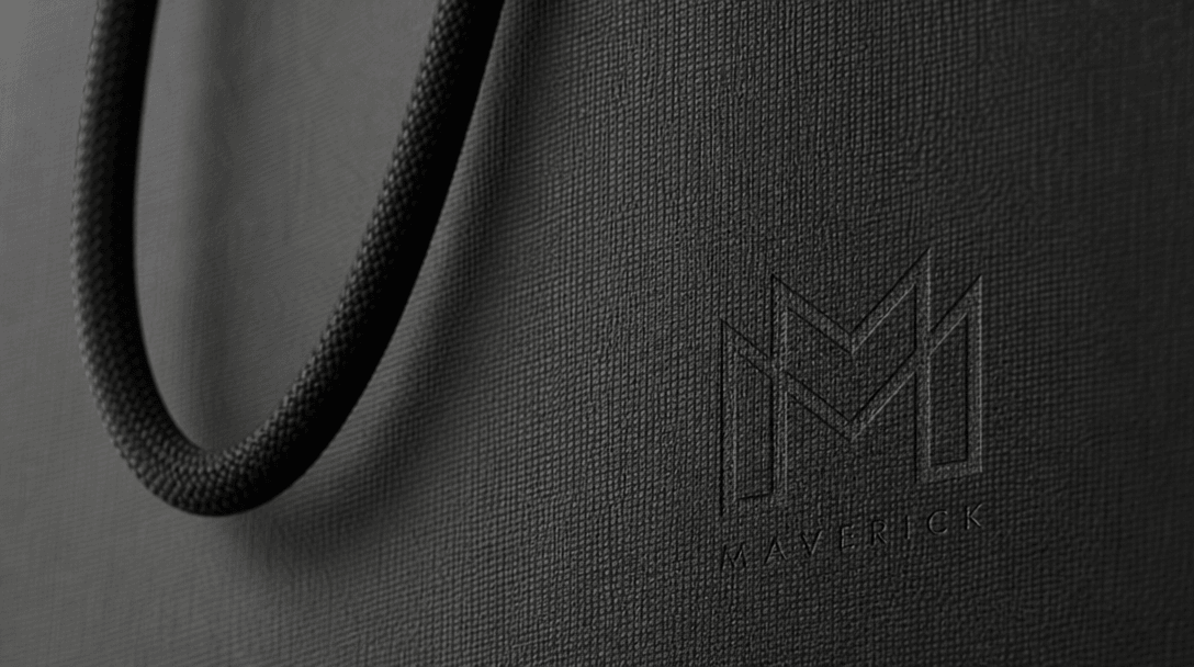 Shopping bag material texture close-up, fabric or premium paper detail, professional lighting, subtle logo design in bac